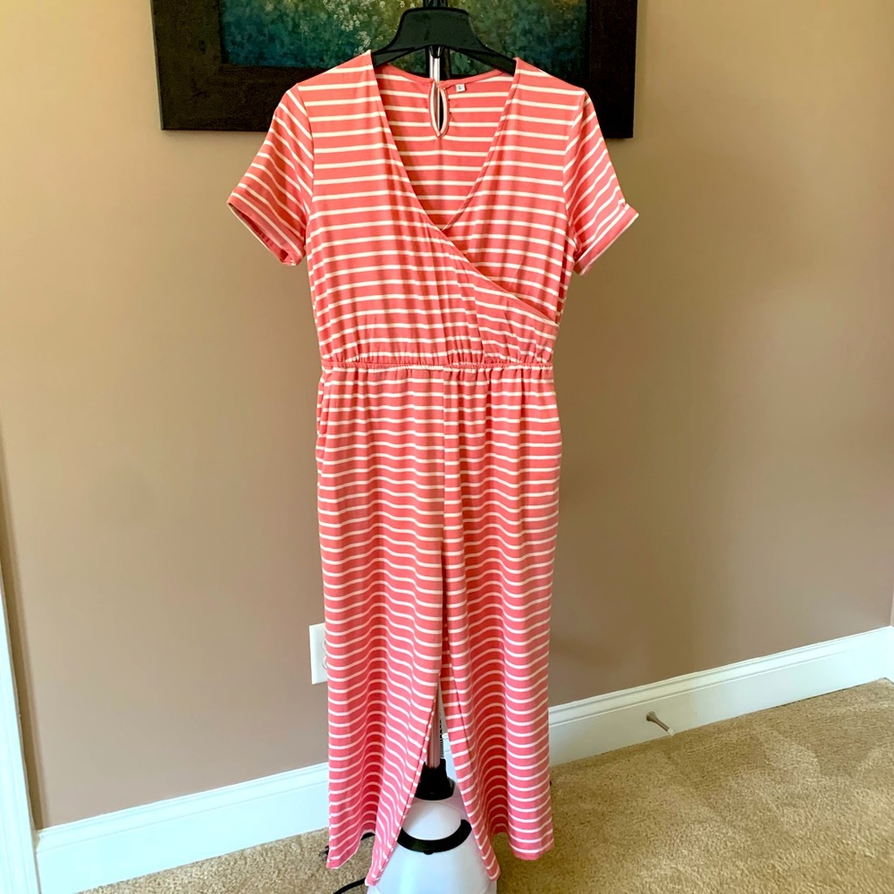 This is a coral, cotton jumpsuit. Sz. Lg.